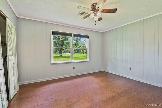 445 W Hickory Grove Rd, Lapine, AL 36046 - unfurnished bedroom featuring wood finished floors, ornamental molding, a textured ceiling, a closet, and ceiling fan