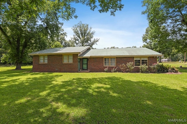 445 W Hickory Grove Rd, Lapine, AL 36046 - view of front of house with a front lawn, brick siding, and a metal roof