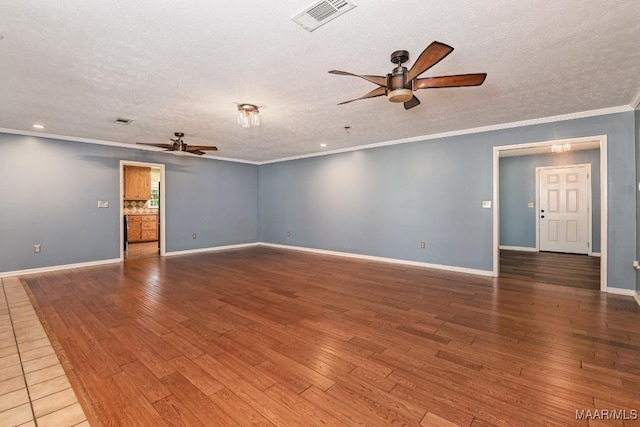 445 W Hickory Grove Rd, Lapine, AL 36046 - spare room featuring ceiling fan, a textured ceiling, wood finished floors, crown molding, and recessed lighting