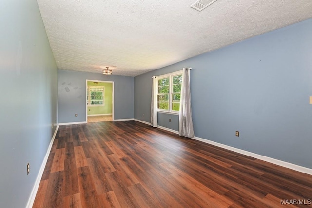 445 W Hickory Grove Rd, Lapine, AL 36046 - spare room featuring wood finished floors and a textured ceiling