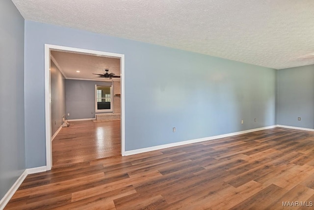 445 W Hickory Grove Rd, Lapine, AL 36046 - empty room featuring wood finished floors, a textured ceiling, ceiling fan, and crown molding