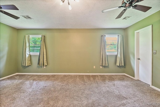 445 W Hickory Grove Rd, Lapine, AL 36046 - empty room with a ceiling fan, carpet floors, and a textured ceiling