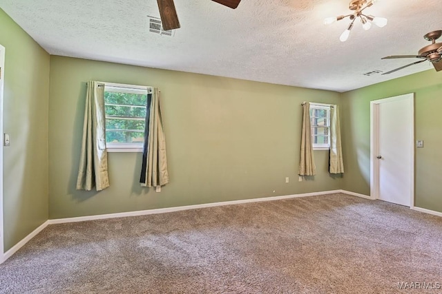 445 W Hickory Grove Rd, Lapine, AL 36046 - carpeted spare room with a ceiling fan and a textured ceiling