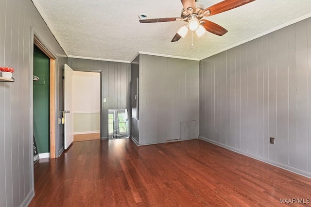 445 W Hickory Grove Rd, Lapine, AL 36046 - unfurnished room featuring wood finished floors, ornamental molding, ceiling fan, a textured ceiling, and wooden walls