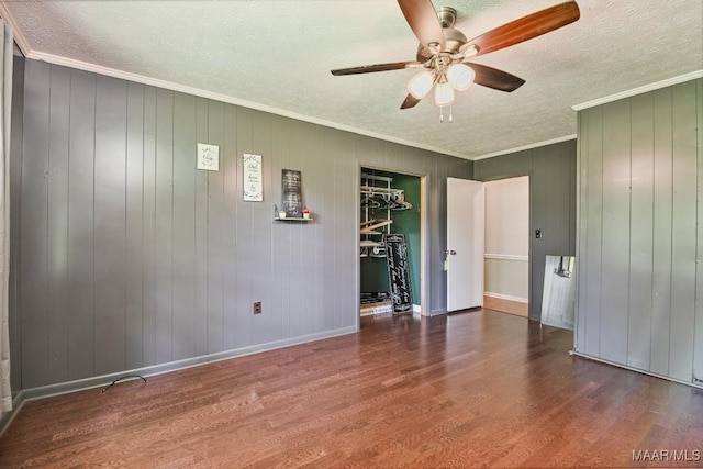445 W Hickory Grove Rd, Lapine, AL 36046 - empty room featuring ceiling fan, wood finished floors, a textured ceiling, and ornamental molding