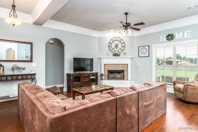 204 Village Way, Wetumpka, AL 36093 - living room with ceiling fan, arched walkways, dark wood-type flooring, ornamental molding, and a fireplace