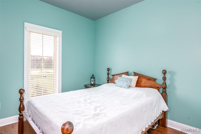 204 Village Way, Wetumpka, AL 36093 - bedroom with baseboards and dark wood-style floors