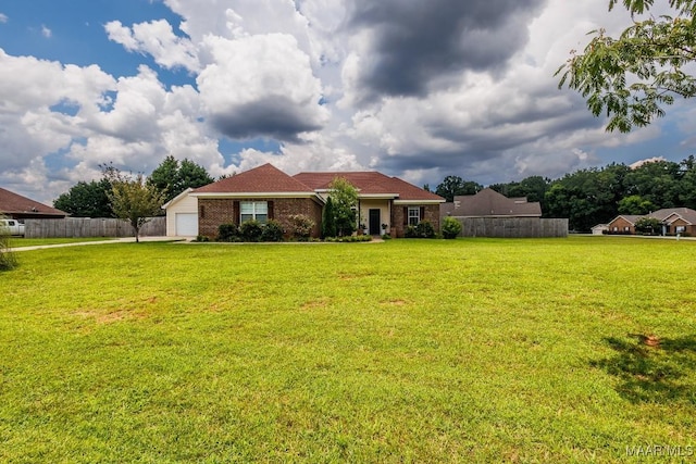 205 Jennifer Ln, Deatsville, AL 36022 - view of front of home with an attached garage and brick siding