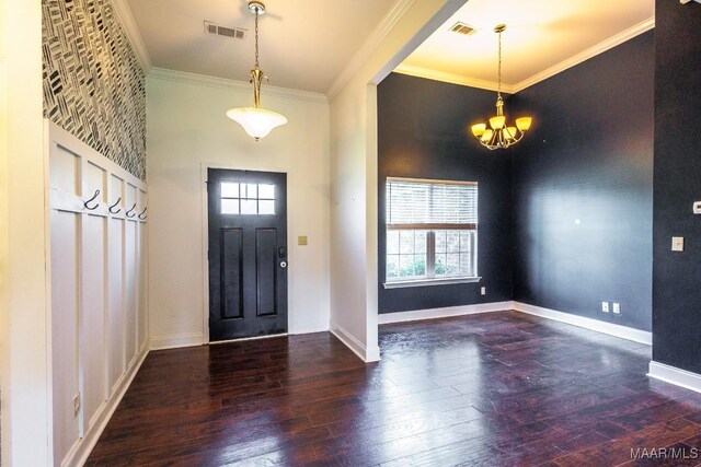 205 Jennifer Ln, Deatsville, AL 36022 - entrance foyer featuring crown molding, wood-type flooring, and a chandelier