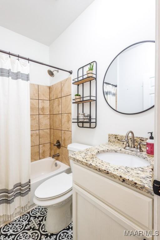 205 Jennifer Ln, Deatsville, AL 36022 - bathroom featuring vanity, shower / tub combo, and tile patterned floors