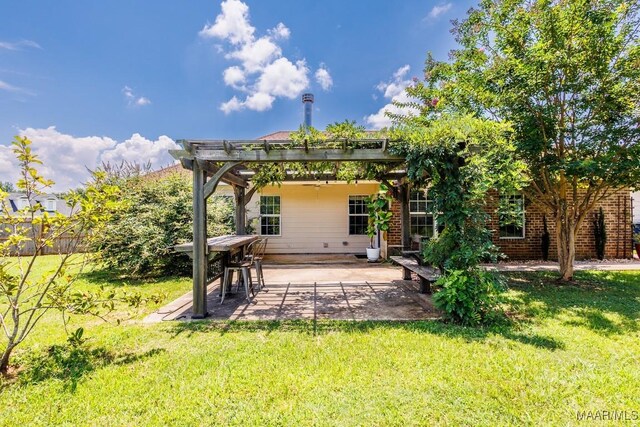 205 Jennifer Ln, Deatsville, AL 36022 - back of property featuring a pergola and a patio area