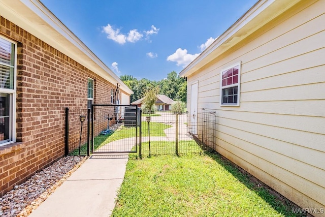 205 Jennifer Ln, Deatsville, AL 36022 - view of yard featuring a gate