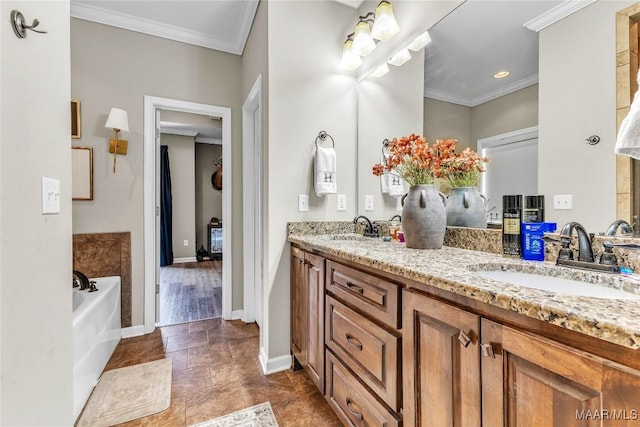 447 Galloway Dr, Wetumpka, AL 36093 - bathroom with crown molding, double vanity, a bath, and tile patterned flooring