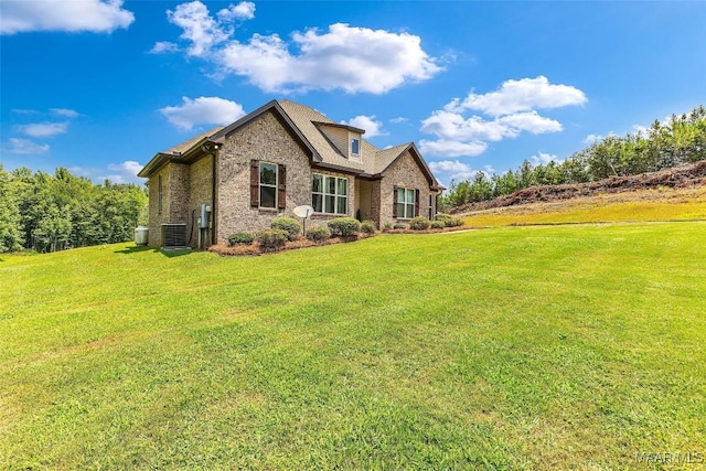 447 Galloway Dr, Wetumpka, AL 36093 - rear view of property featuring brick siding and a yard