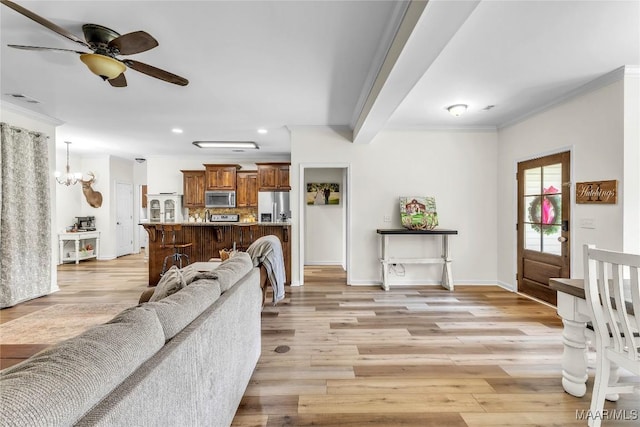 447 Galloway Dr, Wetumpka, AL 36093 - living area featuring recessed lighting, a ceiling fan, light wood-type flooring, crown molding, and a chandelier