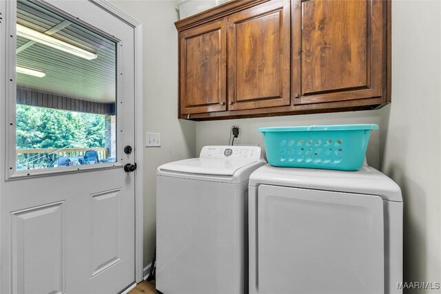 447 Galloway Dr, Wetumpka, AL 36093 - washroom with cabinet space and separate washer and dryer