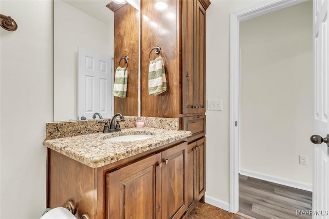 447 Galloway Dr, Wetumpka, AL 36093 - bathroom featuring vanity and wood finished floors