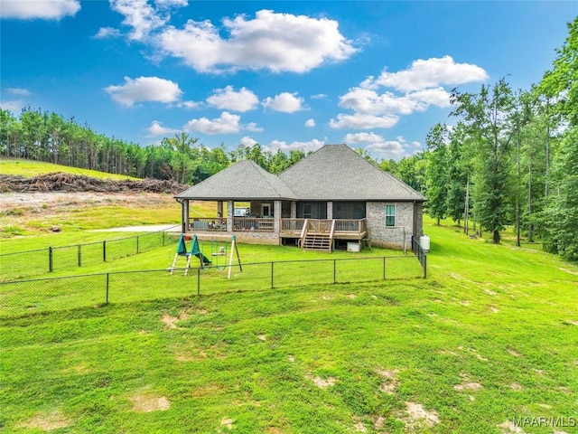 447 Galloway Dr, Wetumpka, AL 36093 - back of house featuring a wooden deck and a fenced backyard