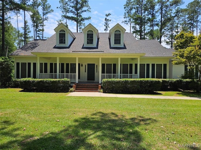 2714 Luverne Hwy, Greenville, AL 36037 - view of front of home featuring a front yard, a porch, and a shingled roof