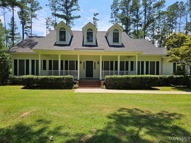 2714 Luverne Hwy, Greenville, AL 36037 - view of front of property featuring a front yard, covered porch, and a shingled roof