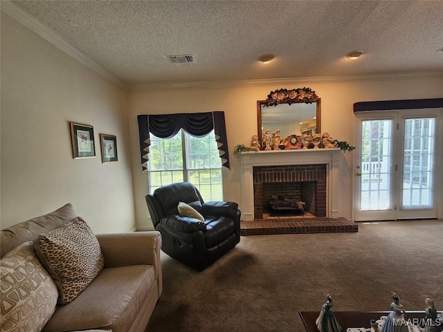 2714 Luverne Hwy, Greenville, AL 36037 - carpeted living area featuring a textured ceiling, ornamental molding, and a brick fireplace