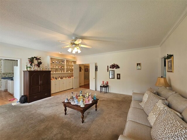 2714 Luverne Hwy, Greenville, AL 36037 - living room featuring a textured ceiling, ornamental molding, light colored carpet, and a ceiling fan
