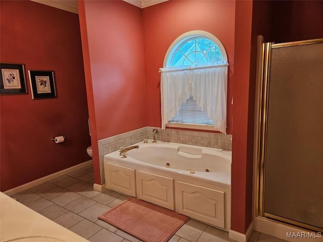2714 Luverne Hwy, Greenville, AL 36037 - bathroom with a tub with jets, a shower stall, tile patterned flooring, and crown molding