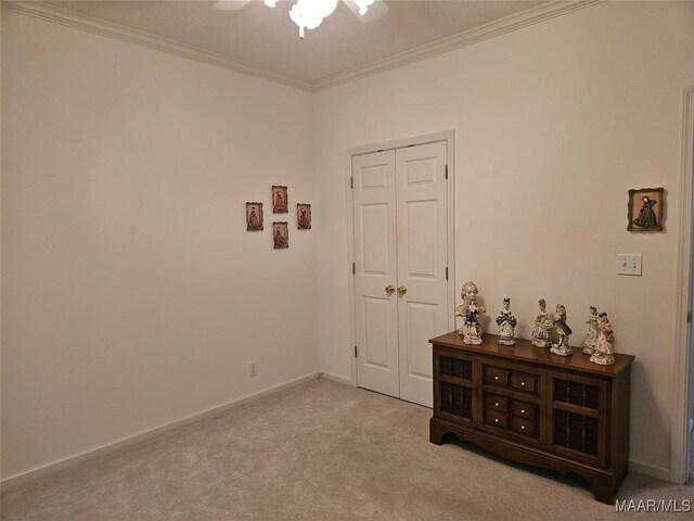 2714 Luverne Hwy, Greenville, AL 36037 - empty room featuring carpet flooring, a ceiling fan, and ornamental molding