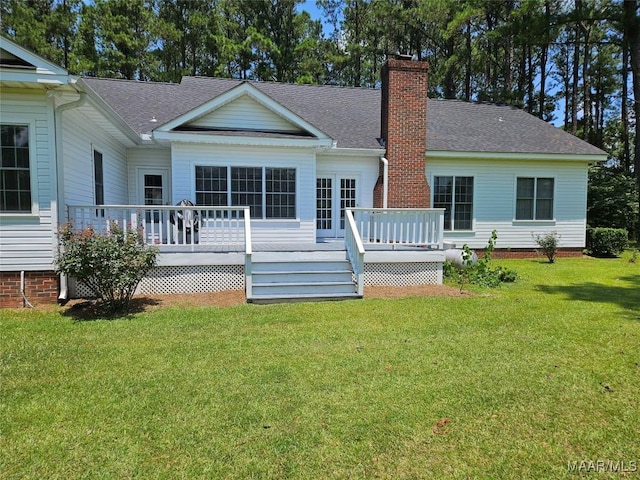 2714 Luverne Hwy, Greenville, AL 36037 - rear view of house with a chimney, roof with shingles, a wooden deck, and a lawn