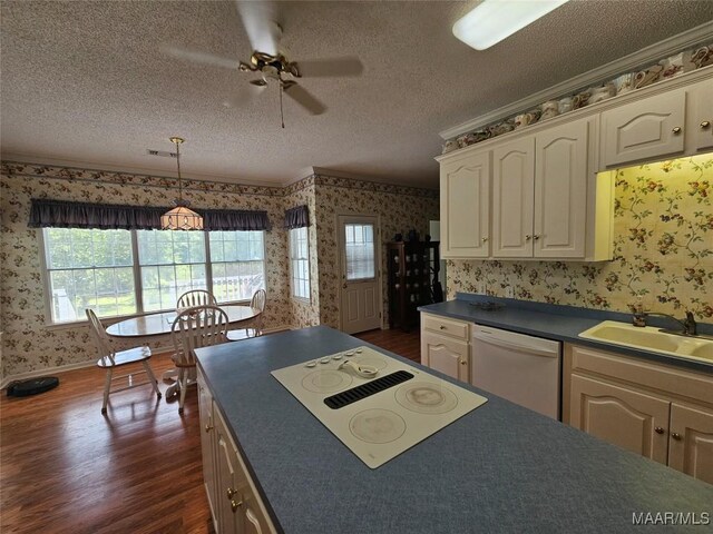 2714 Luverne Hwy, Greenville, AL 36037 - kitchen featuring wallpapered walls, white appliances, dark countertops, dark wood-type flooring, and a ceiling fan