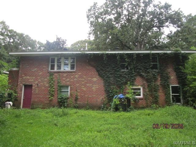 238 Easthaven Rd, Montgomery, AL 36109 - view of home's exterior featuring brick siding and a lawn