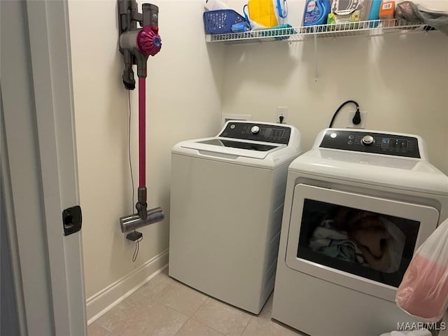 178 Natures Trl, Wetumpka, AL 36093 - washroom featuring washer and dryer and light tile patterned floors