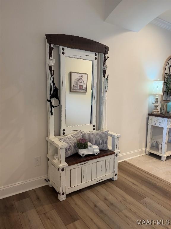 178 Natures Trl, Wetumpka, AL 36093 - hallway with dark wood-style floors and ornamental molding