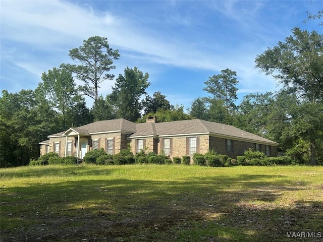2 Rolling Hills Cir, Camden, AL 36726 - single story home with brick siding, a chimney, and a front lawn