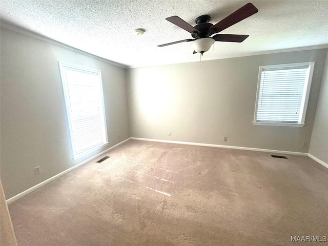2 Rolling Hills Cir, Camden, AL 36726 - carpeted empty room with ornamental molding, a ceiling fan, and a textured ceiling