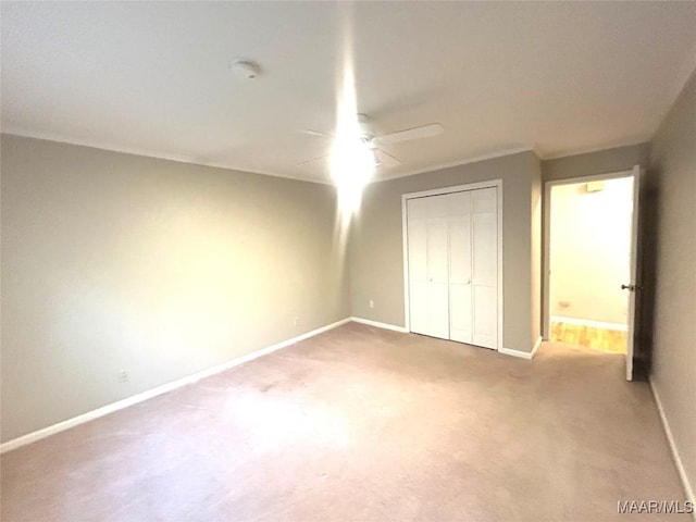 2 Rolling Hills Cir, Camden, AL 36726 - unfurnished bedroom with a closet, carpet, and ceiling fan