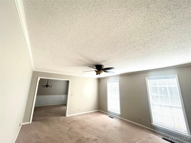 2 Rolling Hills Cir, Camden, AL 36726 - carpeted empty room with a textured ceiling, a ceiling fan, and crown molding