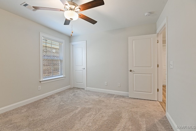 97 Abbington Blvd, Pike Road, AL 36064 - unfurnished bedroom with light colored carpet, a ceiling fan, and a closet
