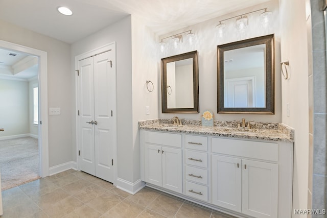 97 Abbington Blvd, Pike Road, AL 36064 - bathroom with double vanity, ornamental molding, and tile patterned floors