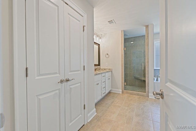 97 Abbington Blvd, Pike Road, AL 36064 - full bathroom with a shower stall, vanity, and tile patterned flooring
