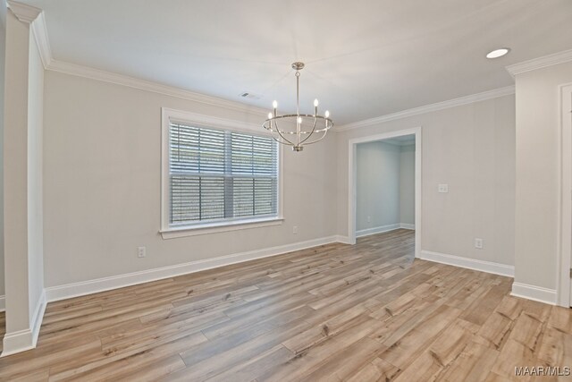 97 Abbington Blvd, Pike Road, AL 36064 - empty room with a chandelier, crown molding, and light wood-type flooring