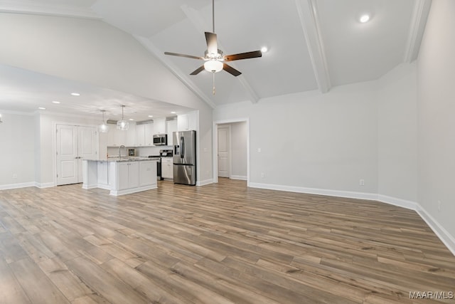 97 Abbington Blvd, Pike Road, AL 36064 - unfurnished living room with a ceiling fan, wood finished floors, recessed lighting, high vaulted ceiling, and ornamental molding