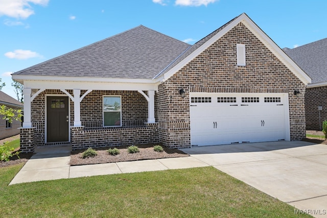 97 Abbington Blvd, Pike Road, AL 36064 - craftsman-style house with an attached garage, a shingled roof, brick siding, and driveway