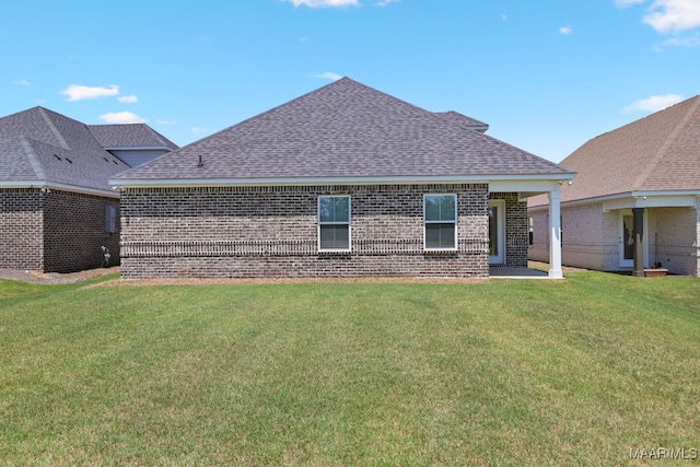 97 Abbington Blvd, Pike Road, AL 36064 - rear view of property featuring brick siding, a shingled roof, and a lawn