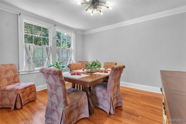 17 Calhoun Rd, Montgomery, AL 36109 - dining room with a chandelier, ornamental molding, and light wood-type flooring
