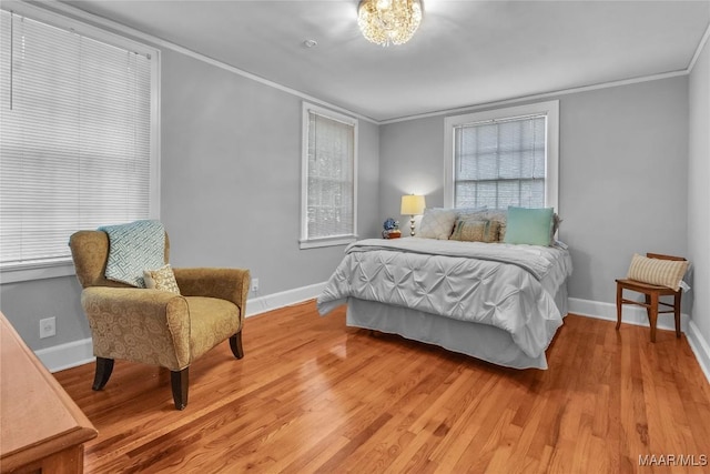 17 Calhoun Rd, Montgomery, AL 36109 - bedroom with crown molding and light wood finished floors