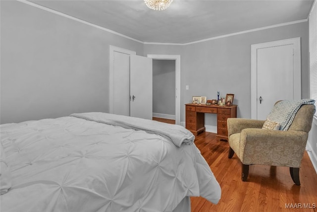 17 Calhoun Rd, Montgomery, AL 36109 - bedroom featuring wood finished floors and crown molding
