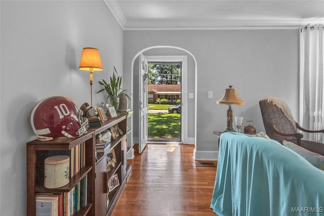 17 Calhoun Rd, Montgomery, AL 36109 - entrance foyer with ornamental molding, wood finished floors, and arched walkways