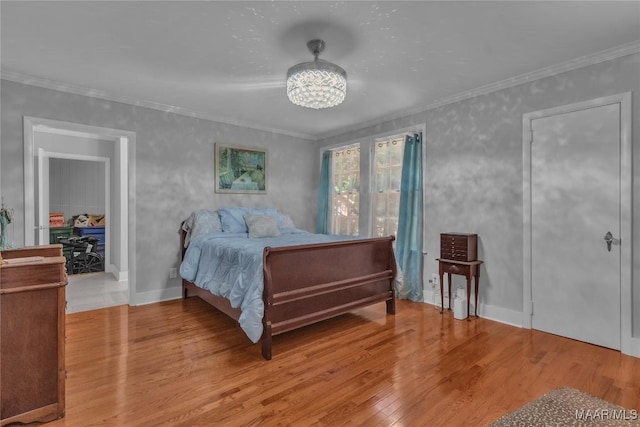 17 Calhoun Rd, Montgomery, AL 36109 - bedroom with wood finished floors, crown molding, a chandelier, and an office area