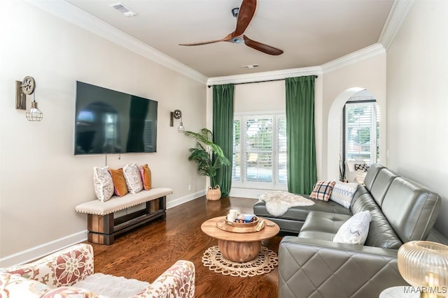 8712 Old Marsh Way, Montgomery, AL 36117 - living area featuring crown molding, arched walkways, plenty of natural light, ceiling fan, and wood finished floors